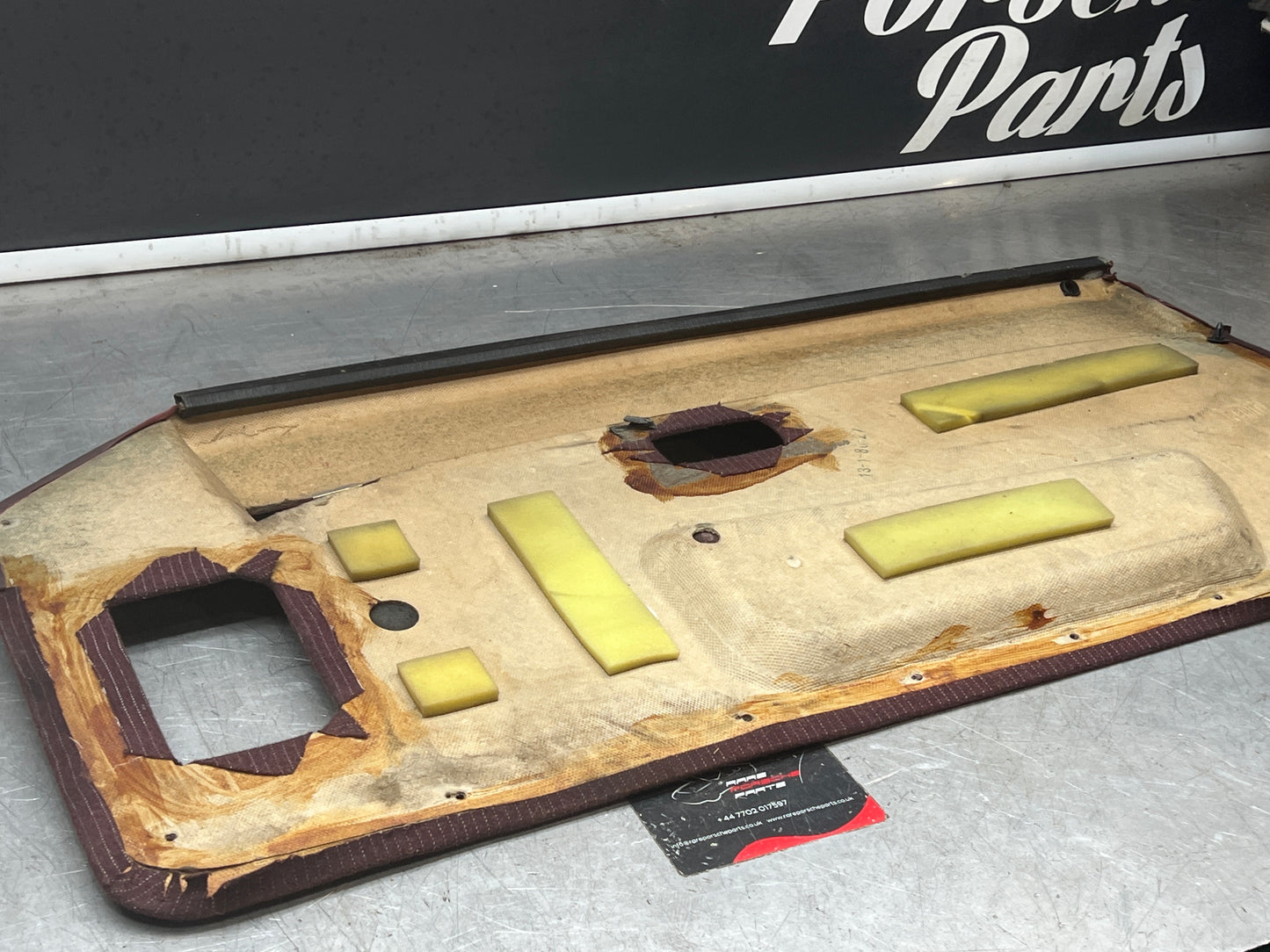 Porsche 944 left burgundy pinstripe door card for late cars from 85.5 944555017