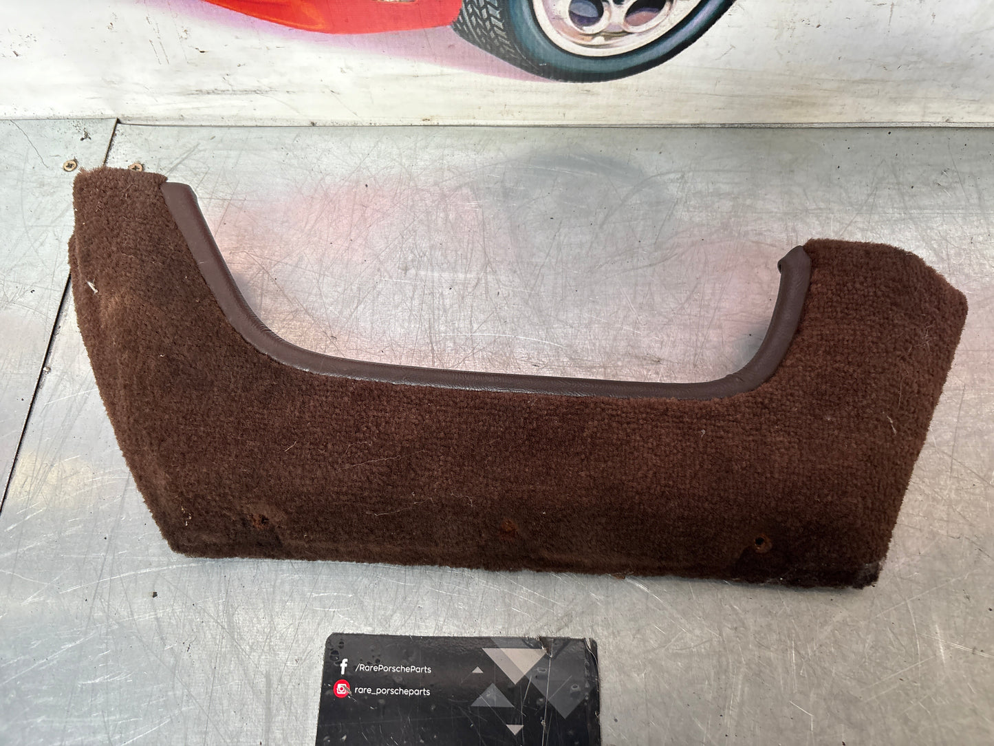924/944 right, driver side brown carpeted door pocket, used  477867134