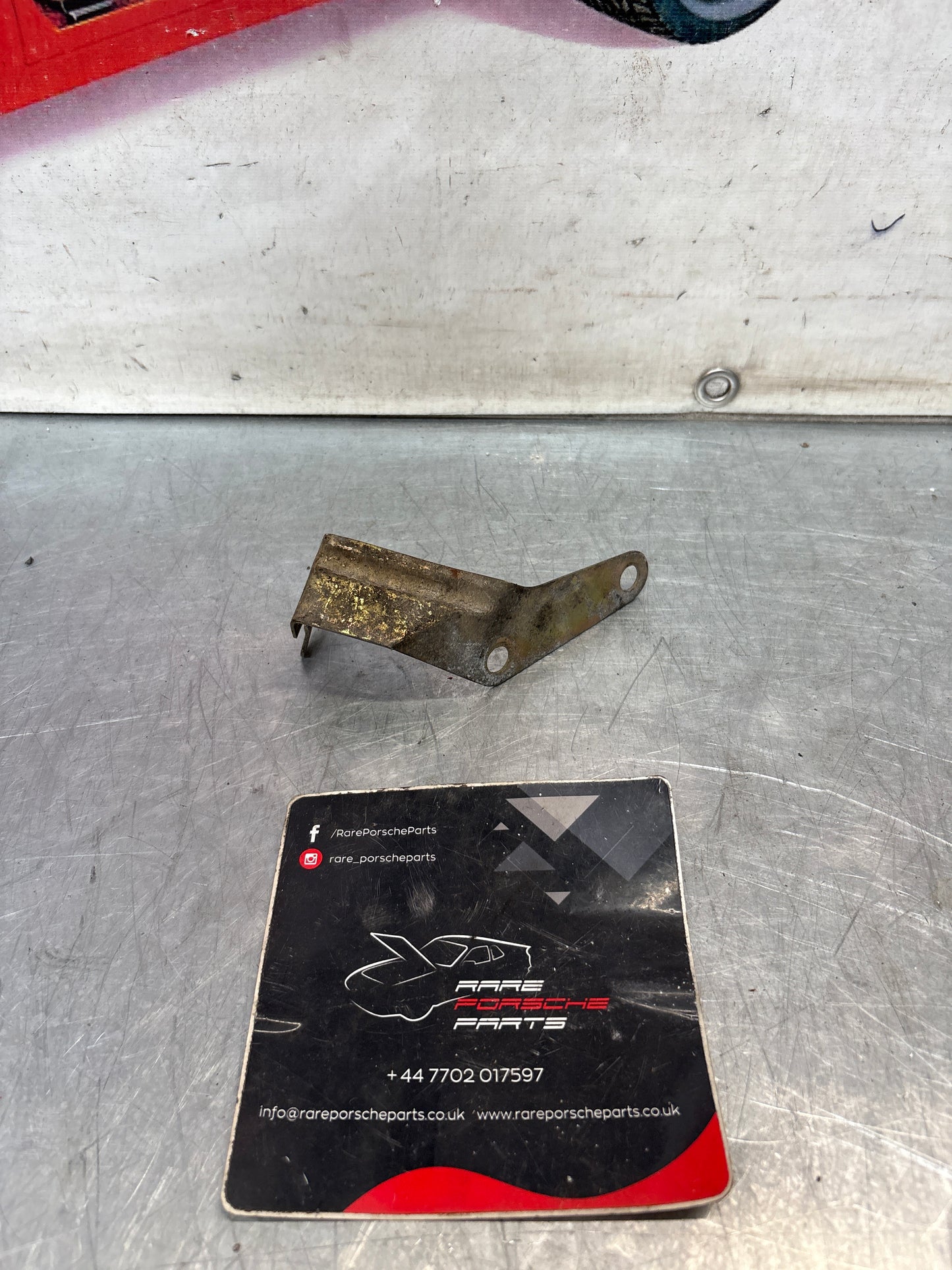 Porsche 924 Turbo, Carrera GT clutch hose bracket, used 477721191