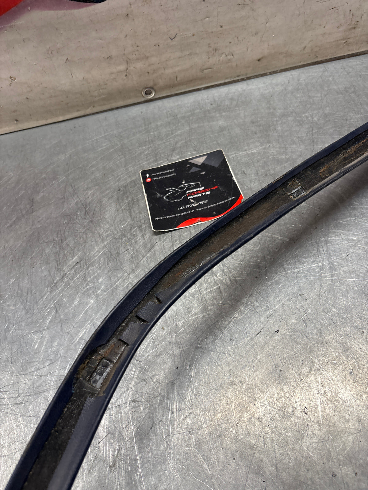 Porsche 928 right, off side door upper frame surround trim, marine blue 92855502602, used