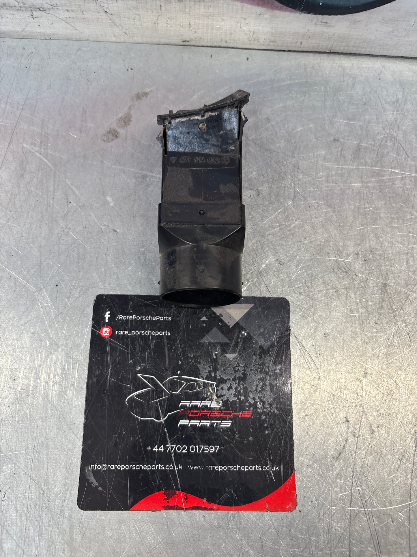 Porsche 924/944 Black dash air vent. Right hand, with connecting piece 477819232 / 477819717 used