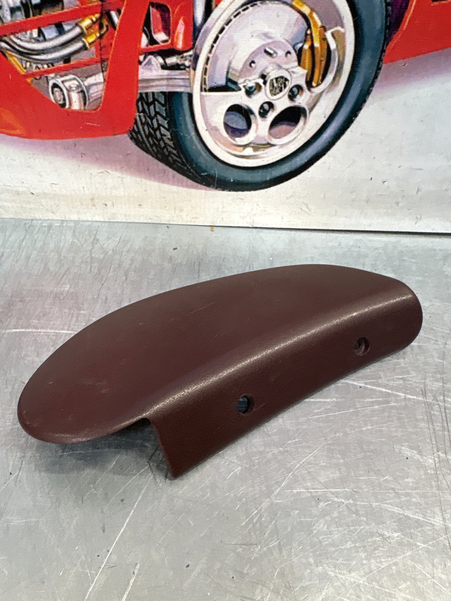 Porsche 928 seat hinge cover, burgundy, used 92852114702