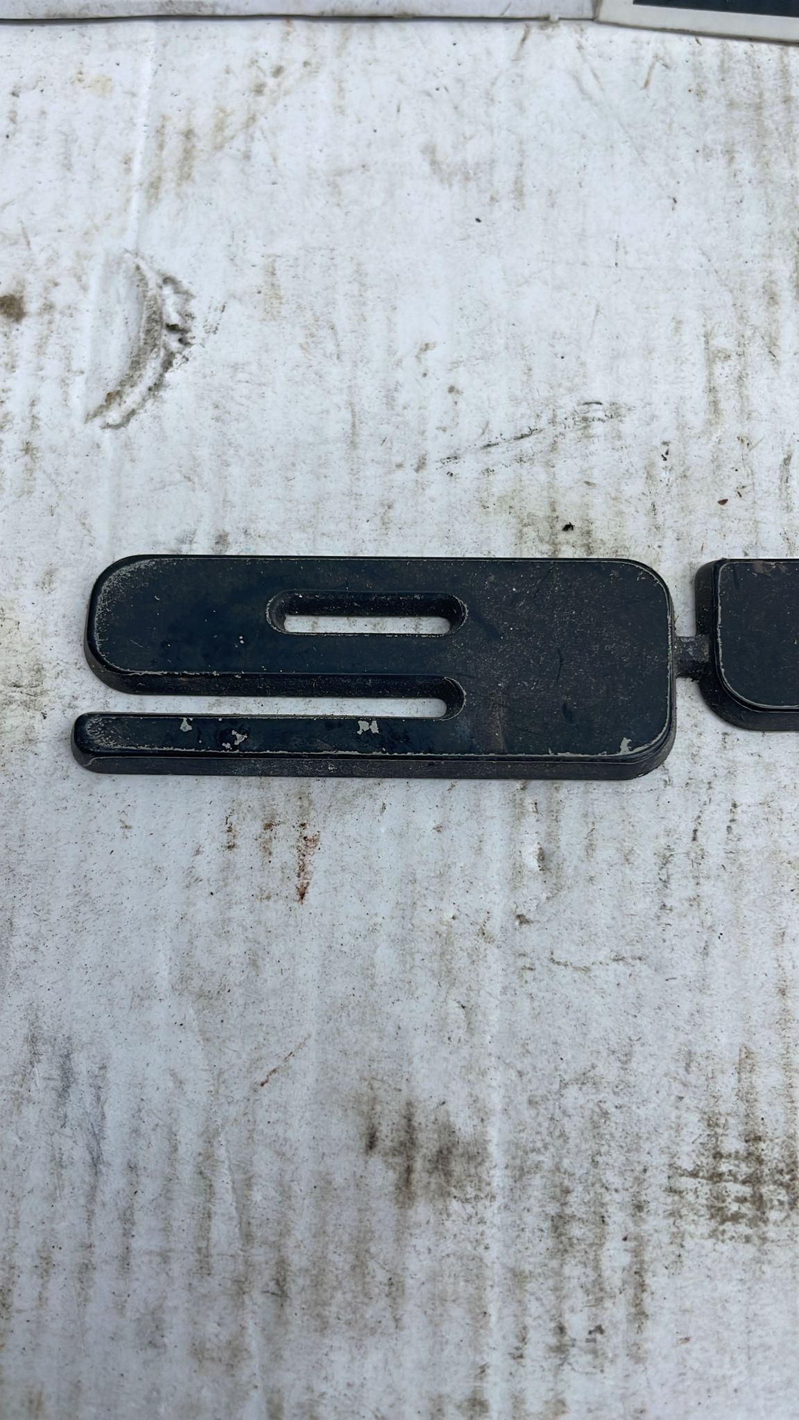 Porsche 944 S Rear tailgate badge. Black original used.