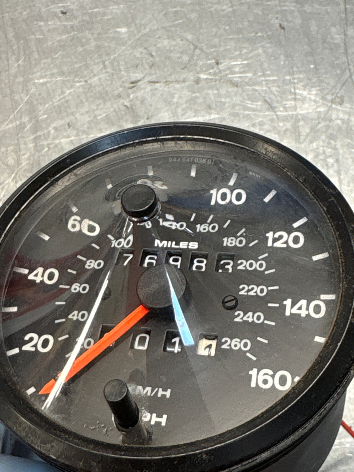 Porsche 924 S speedometer showing 76983 miles 94464103601 used