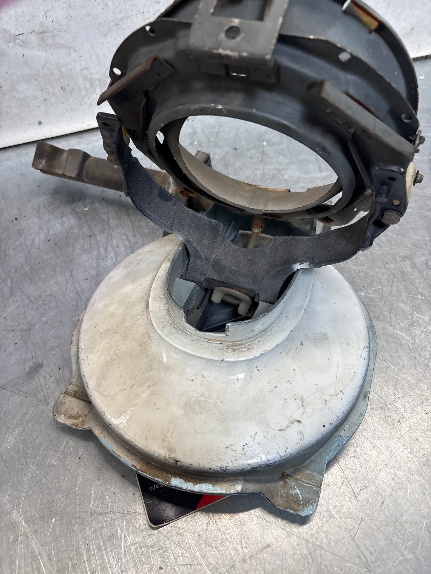 Porsche 928 left headlight swivel frame 92875024902 92875024302 used