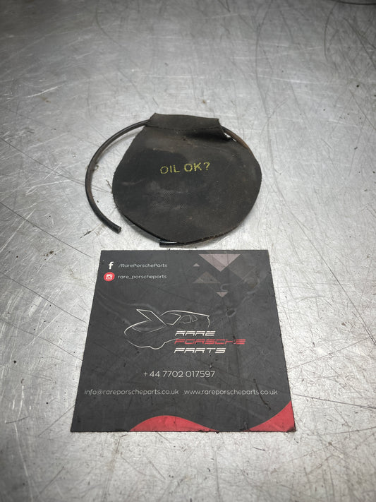 Porsche 944 fuel snap ring with protective round flap, used 90090604503 / 92820105702