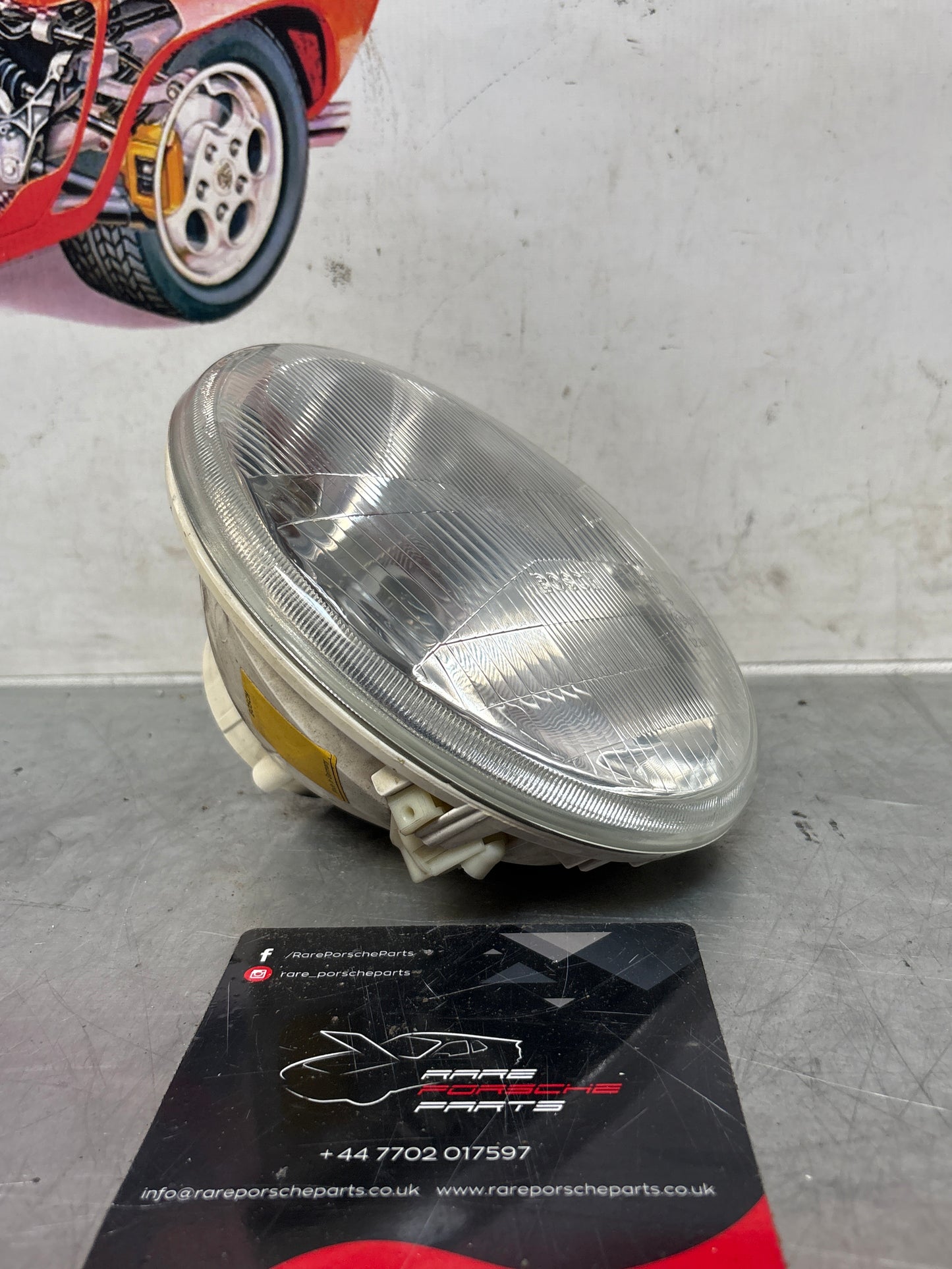 Porsche 968 Left side Bosch headlight, used 94463192900 / 0301900309 / 1305304021