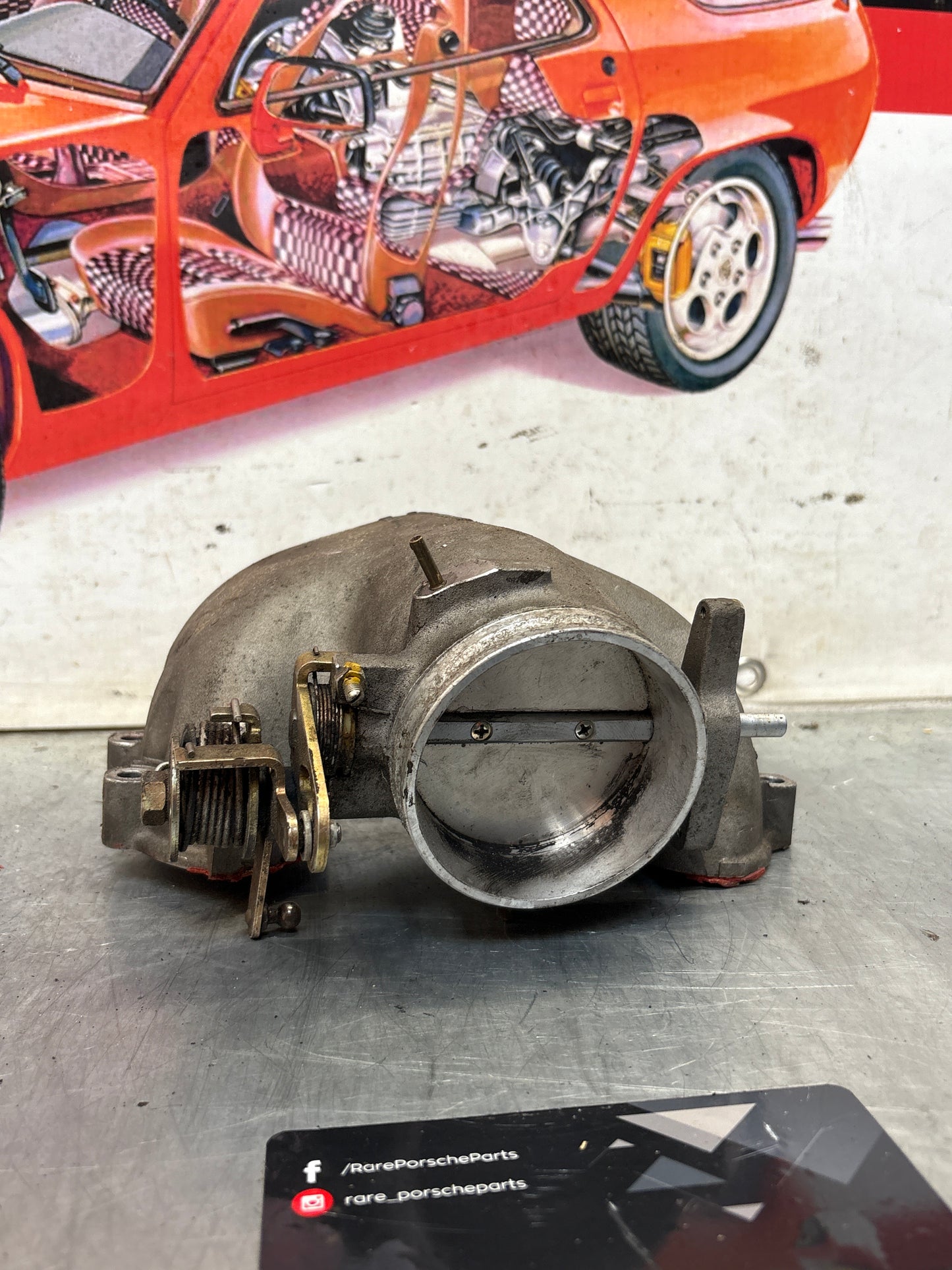 Porsche 928 throttle body intake bridge idle speed control valve, used 9281101210R