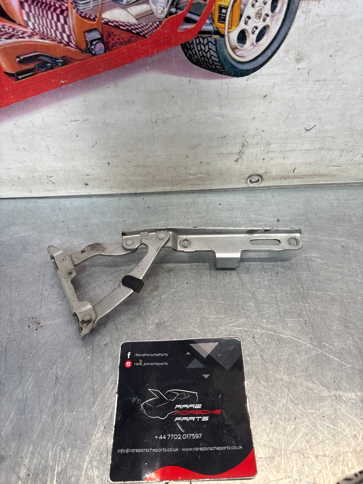 Porsche 911 996 / 986 engine deck lid hinge left side, used 99651215101