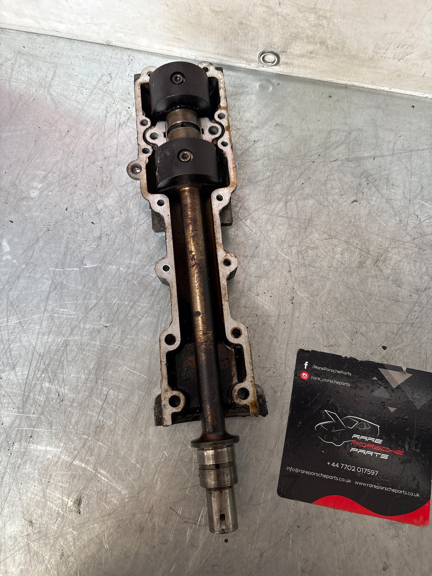 Porsche 924 2.5 / 944 Balance shaft, with housing, used 9441011080R