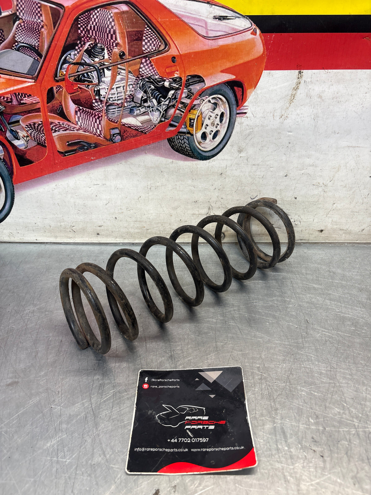 Porsche 924 coil spring, green, used 477411105M954
