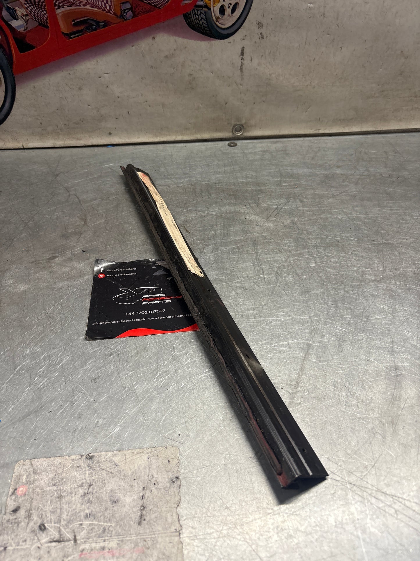 Porsche 928 left sunroof guide rail, used 92856401541