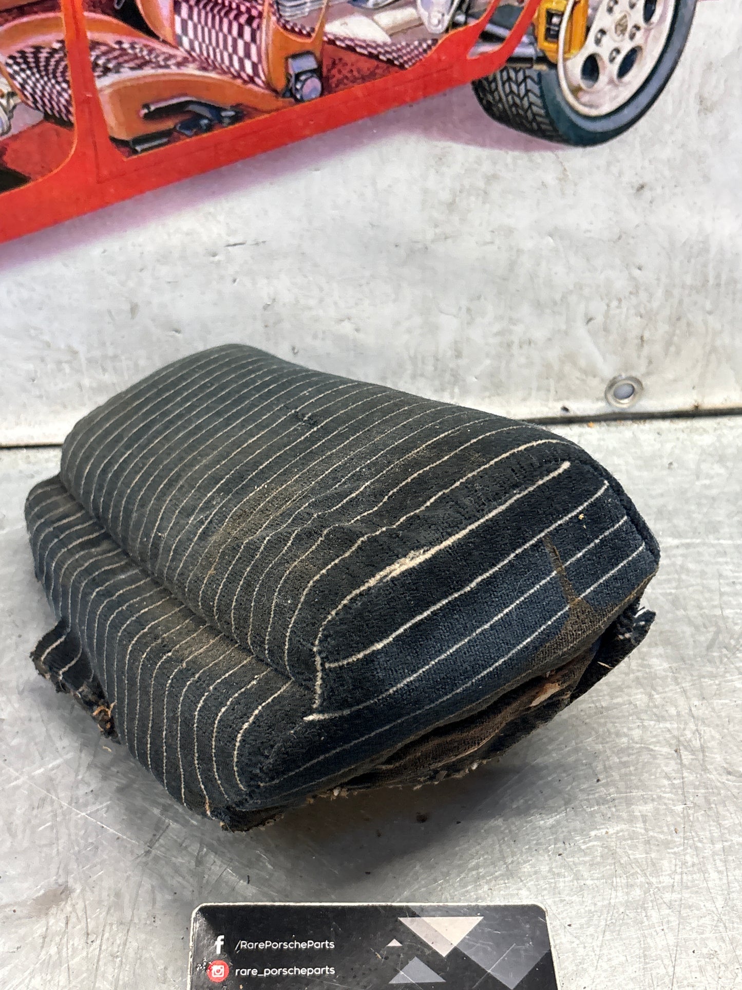 Porsche 928 rear left seat centre cushion,black pinstripe, carpeted, used 92852208751