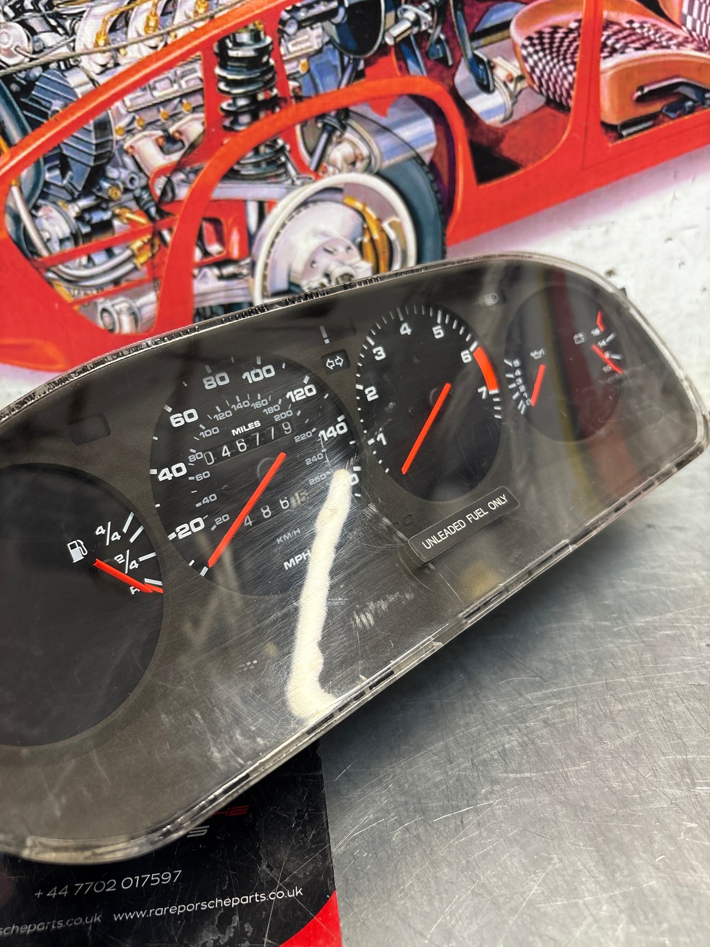 Porsche 928 dash clock binnacle pod speedometer, 92864110235 used  showing 046779 Km, plastic screen has some scratches