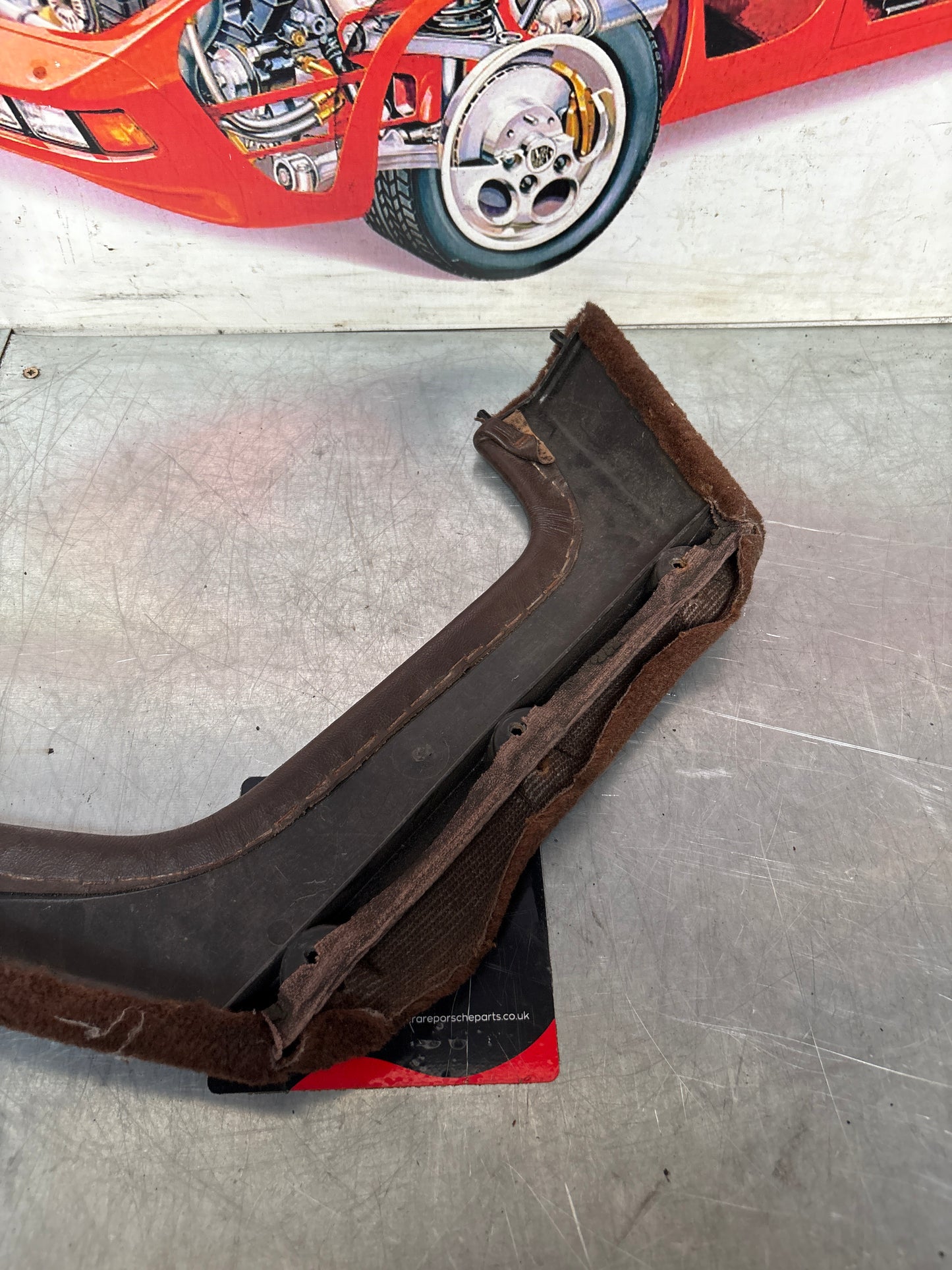 924/944 Left, Passenger side brown carpeted door pocket, used 477867133