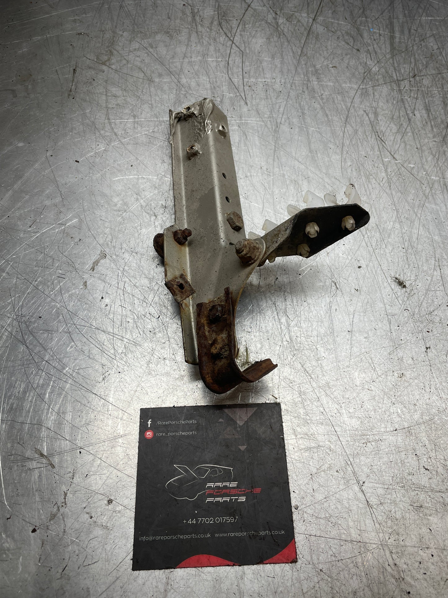 Porsche 924 944 Used wing to Body Reinforcement bracket, with powersteering cooler bracket, left 477805058A used