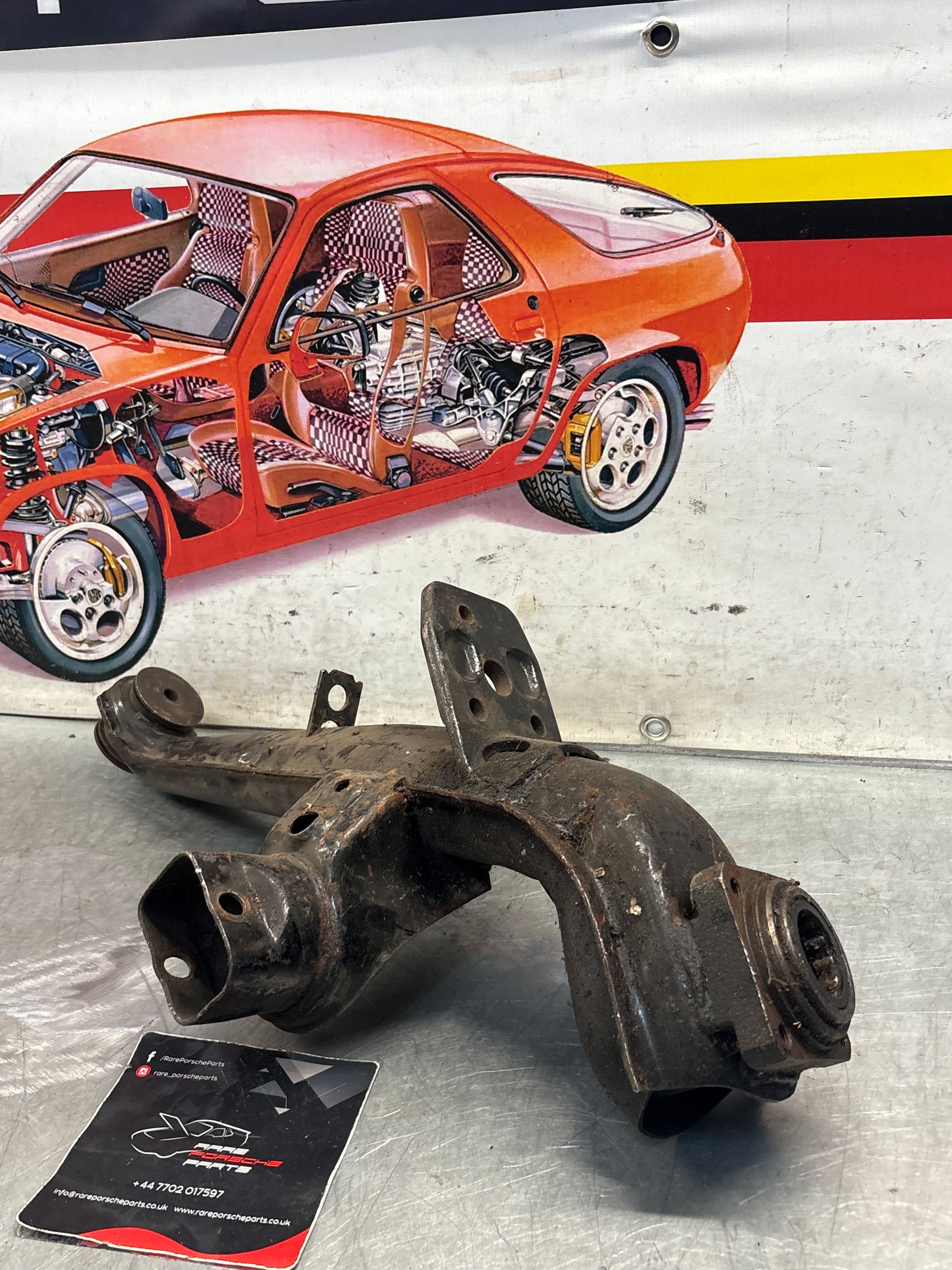 Porsche 924 944  -85.5 Rear left trailing arm, used 94433102100