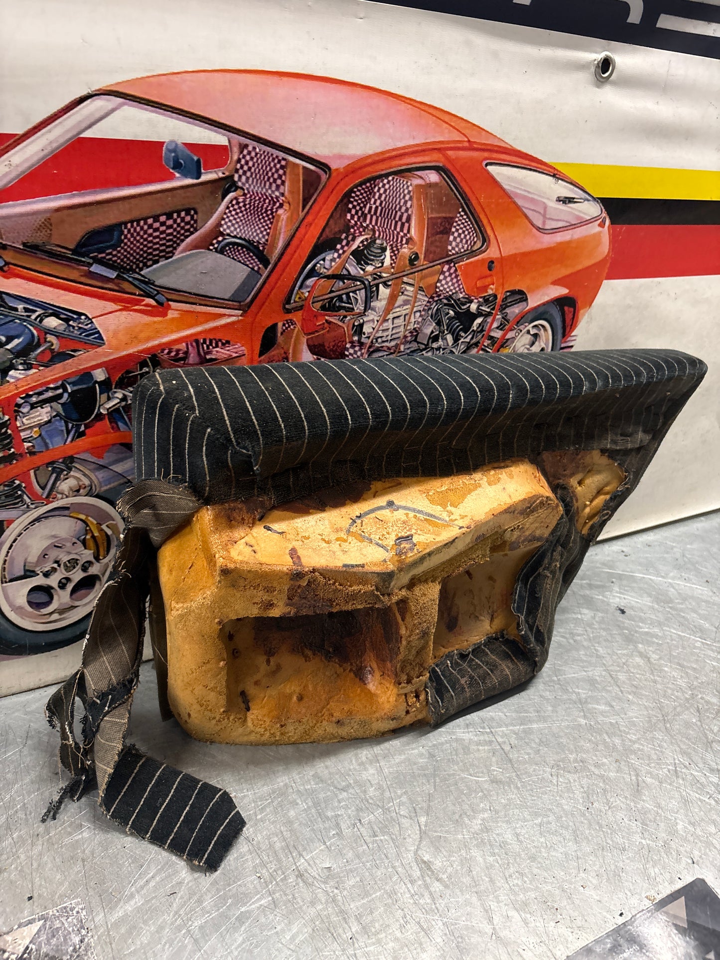 Porsche 928 rear left seat cushion, black-white pinstripe , carpeted, used 92852205951