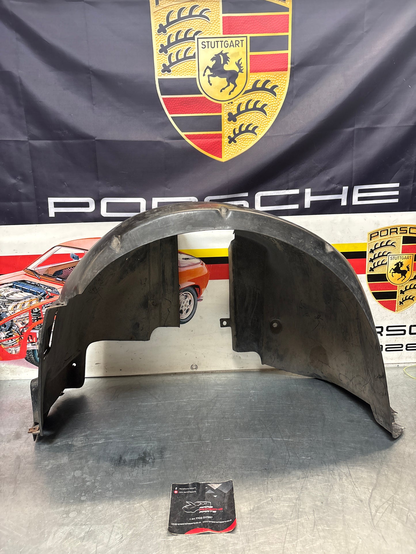 Porsche 944 from 85.5 wheel arch liner  Left, 94450438101 Used