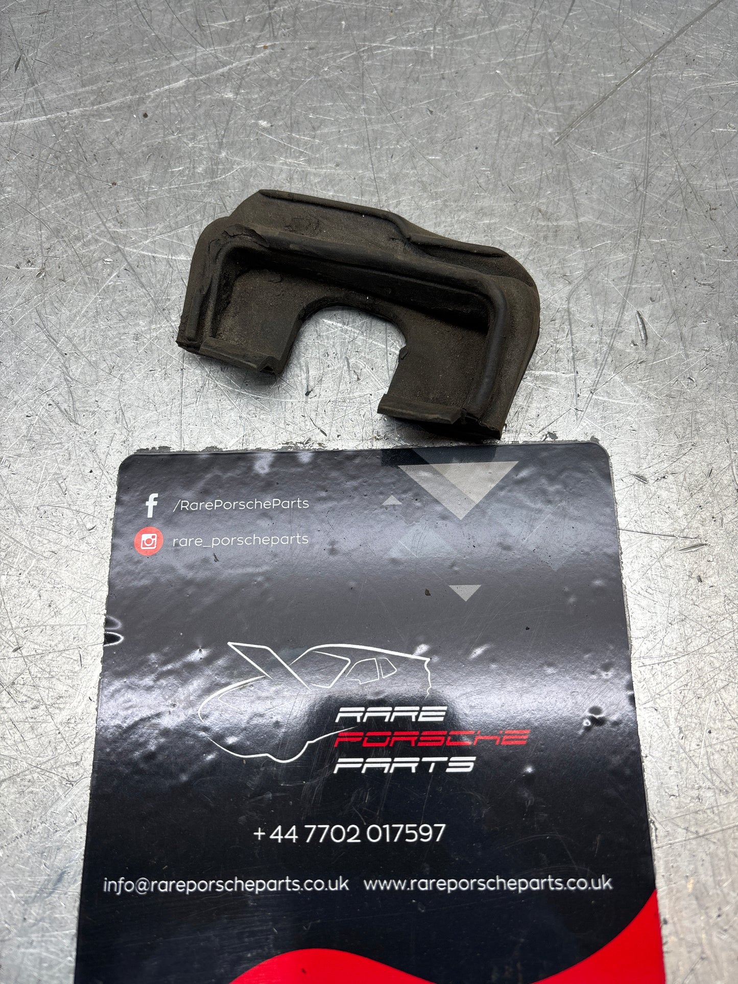 Porsche 944, S2/ 924S right tailgate latch pin gasket rubber, used 94451236601