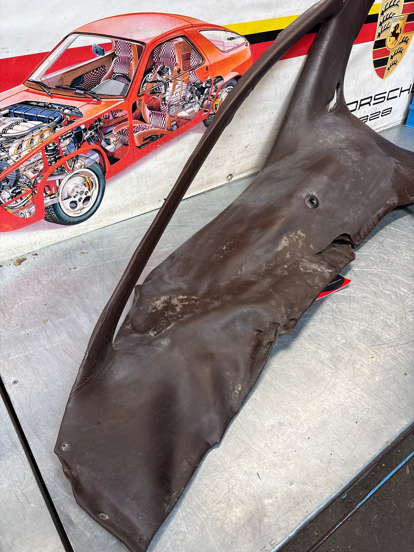 Porsche 928 early left side lower side trim panel, without loudspeaker, burgundy used 92855502102