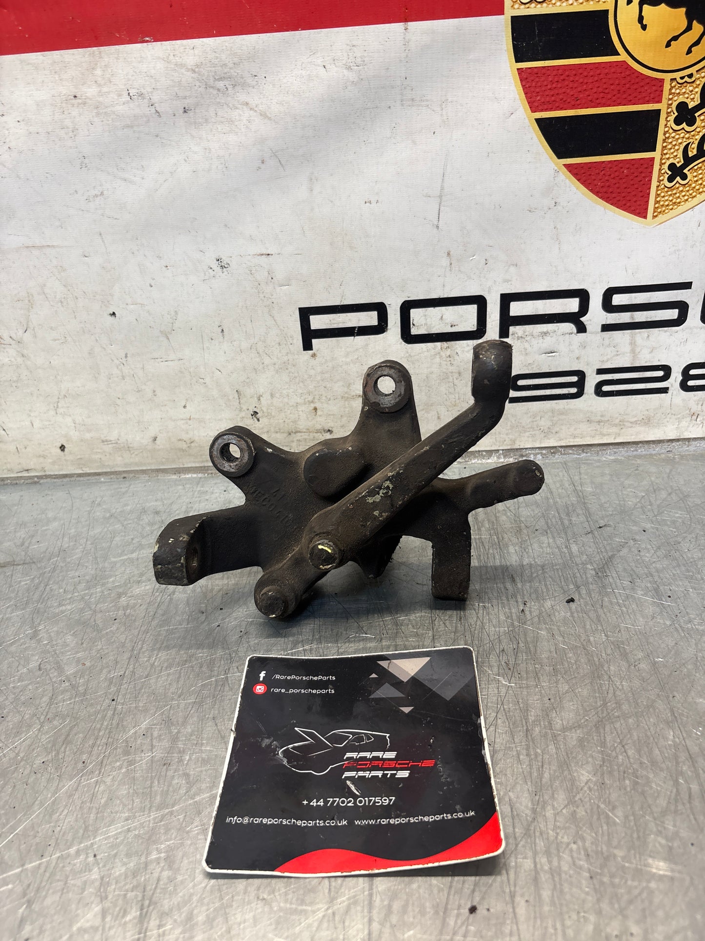 Porsche 928 right steering spindle knuckle, used 92834105817