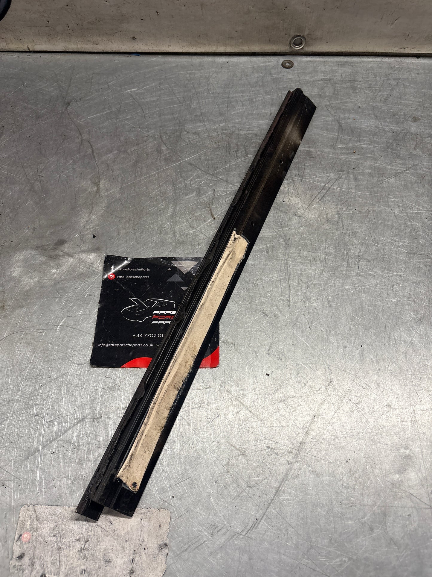 Porsche 928 left sunroof guide rail, used 92856401641
