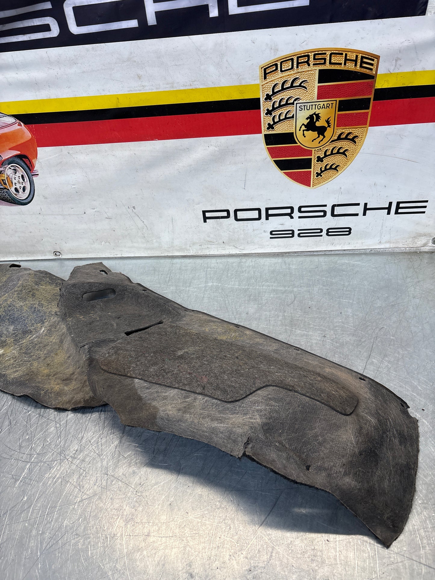 Porsche 924/944 85.5- rear left side trim carpet, black, 94455508301, used