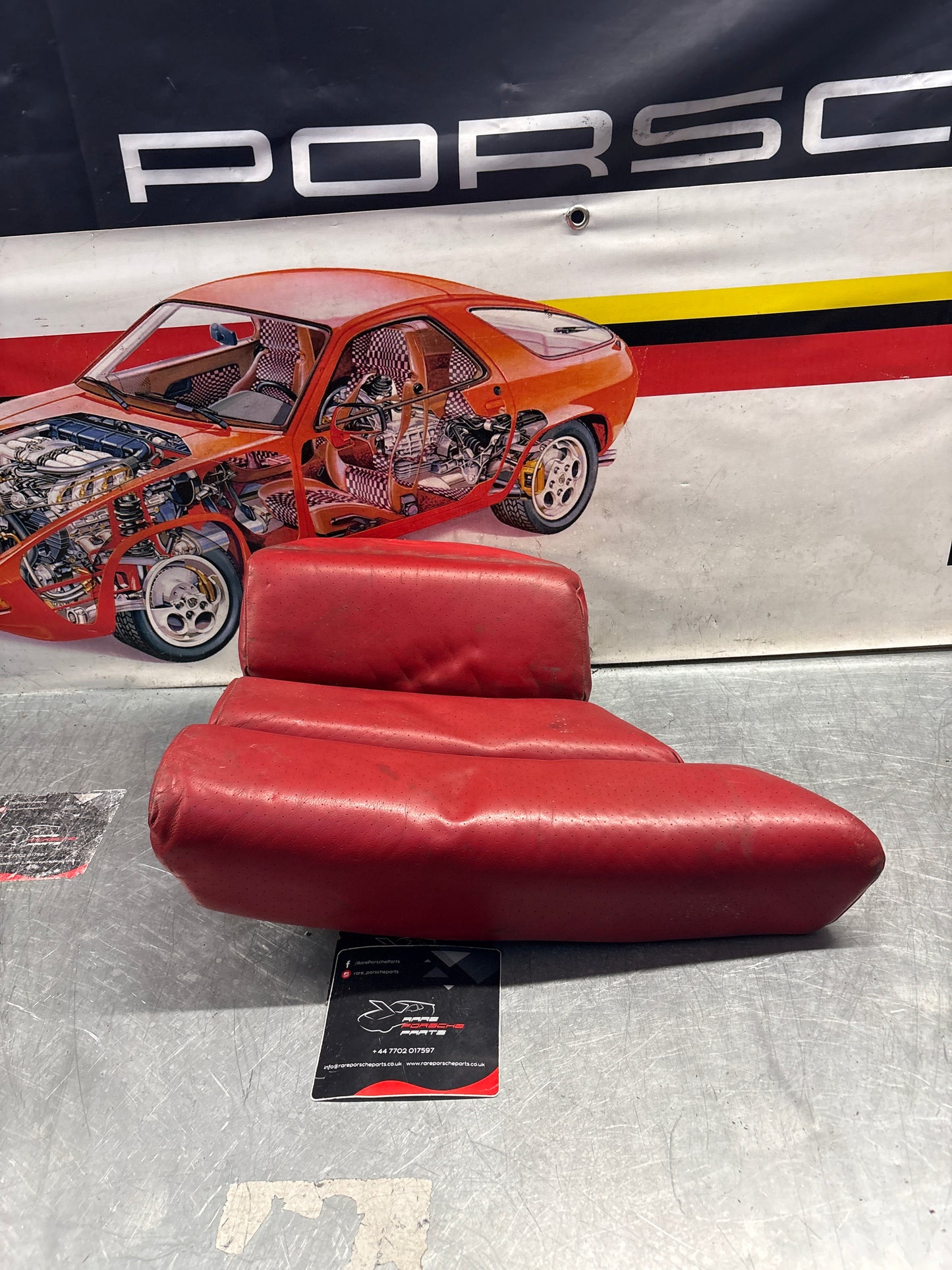 Porsche 928 rear left seat and center cushion, used, can-can red 92852205951 / 92852208751