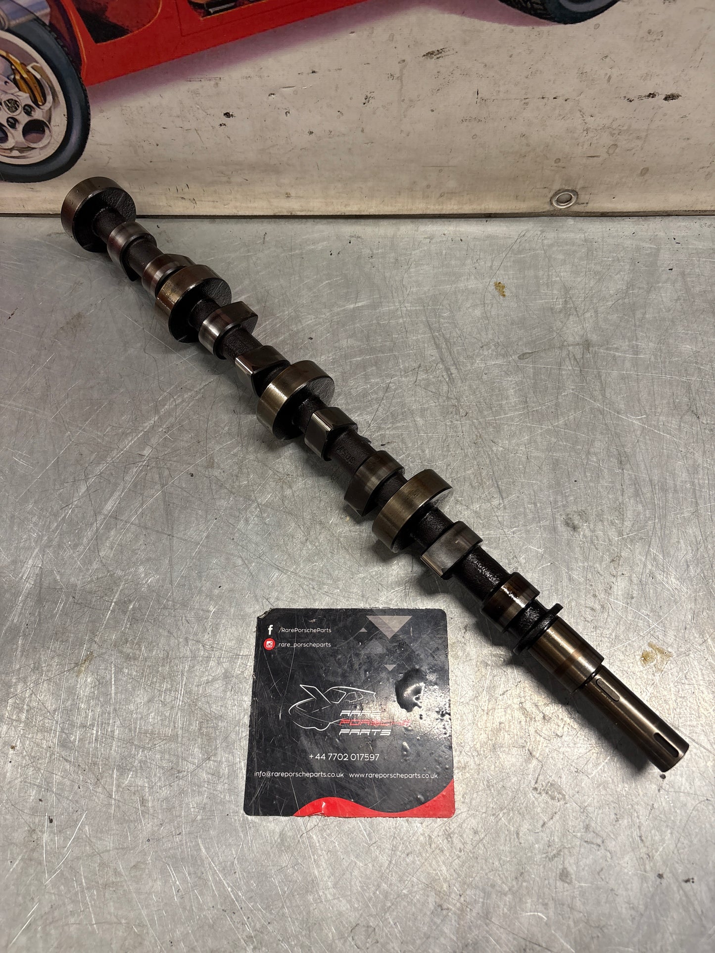 Porsche 928 cam shaft, used 9281052040R