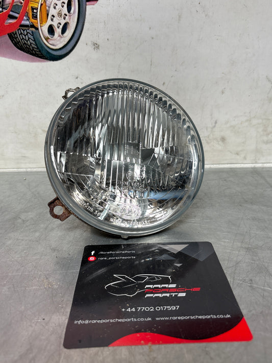 Porsche 924 / 944 Hella H4 headlight, used 477941771 / 317115367