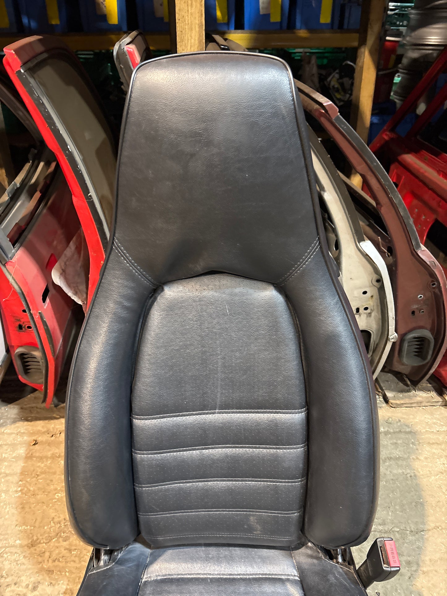 Porsche 944 black front right seat with Porsche scripted fabric