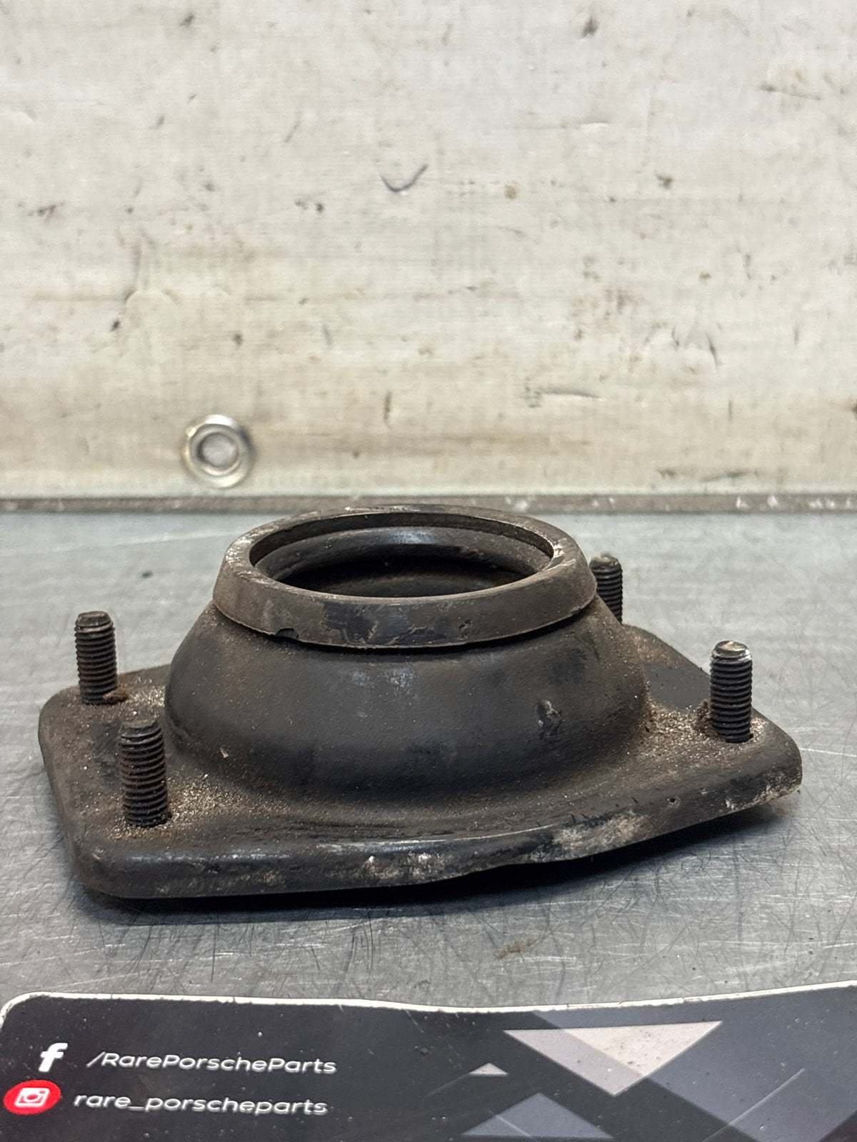 Porsche 924 / 944 front suspension bearing flange, 477412345, used