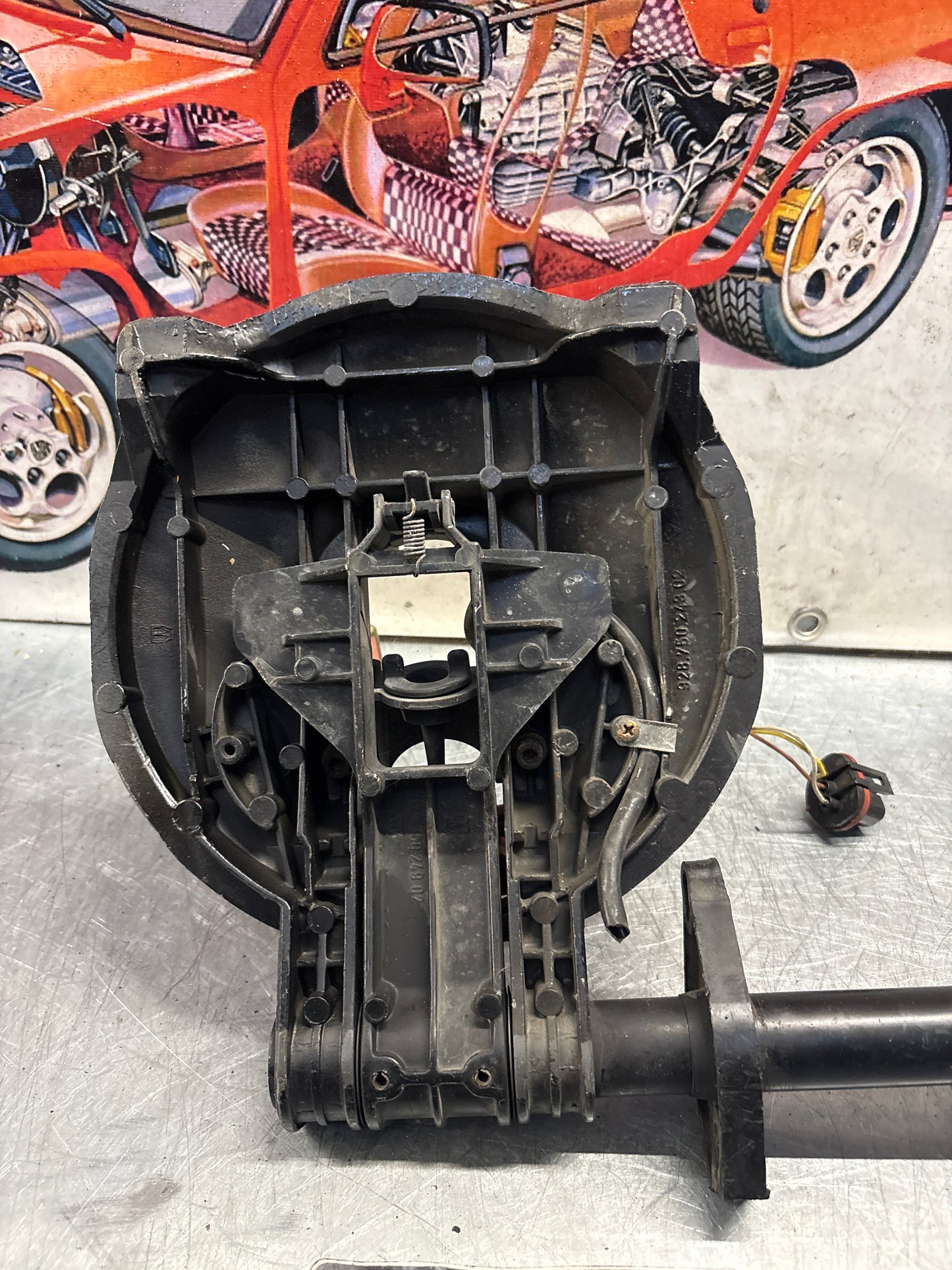 Porsche 928 right headlight swivel frame 92875024902 92875024302 used