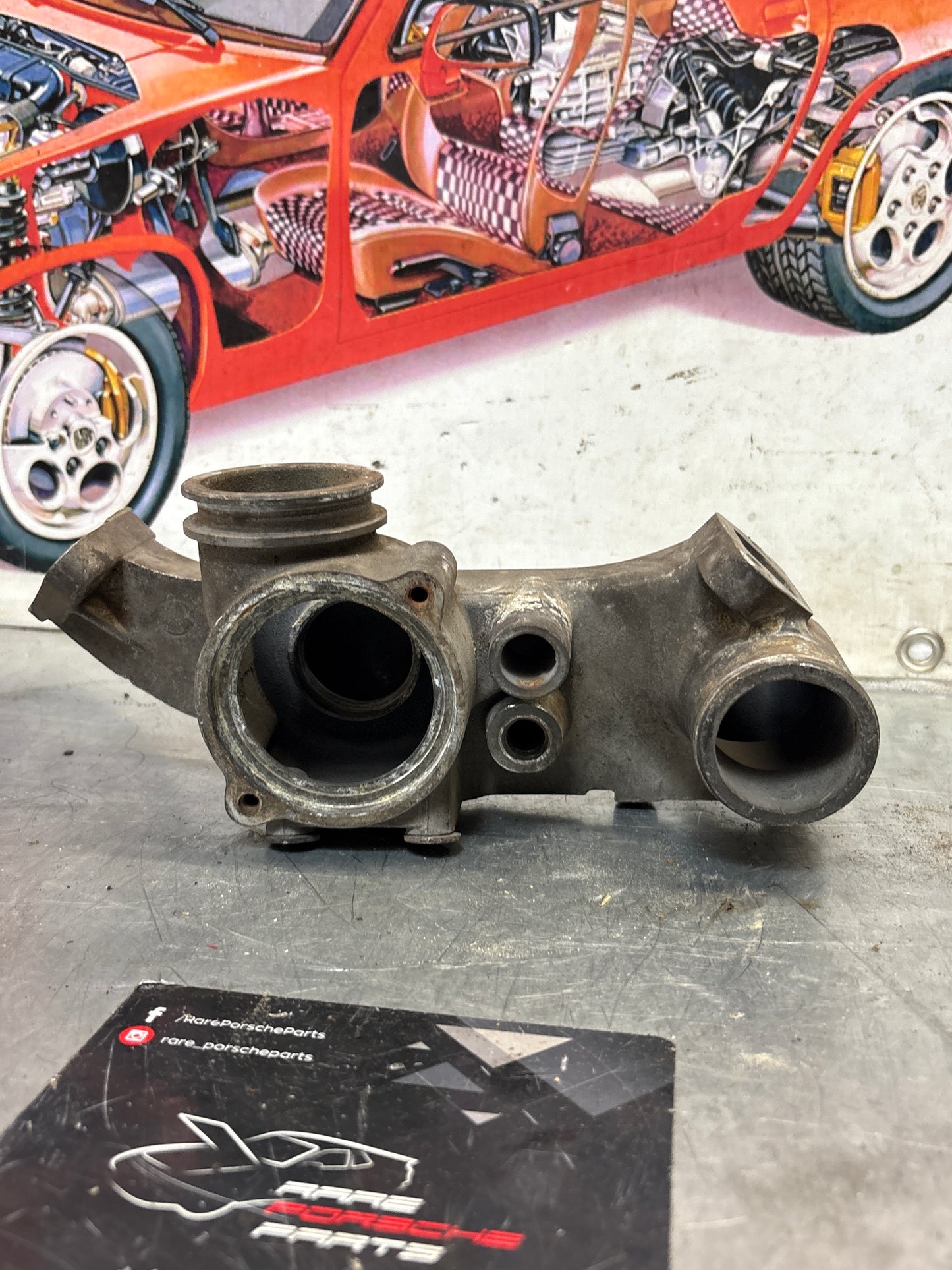 Porsche 928S 78-84 engine thermostat housing, used 9281061614R