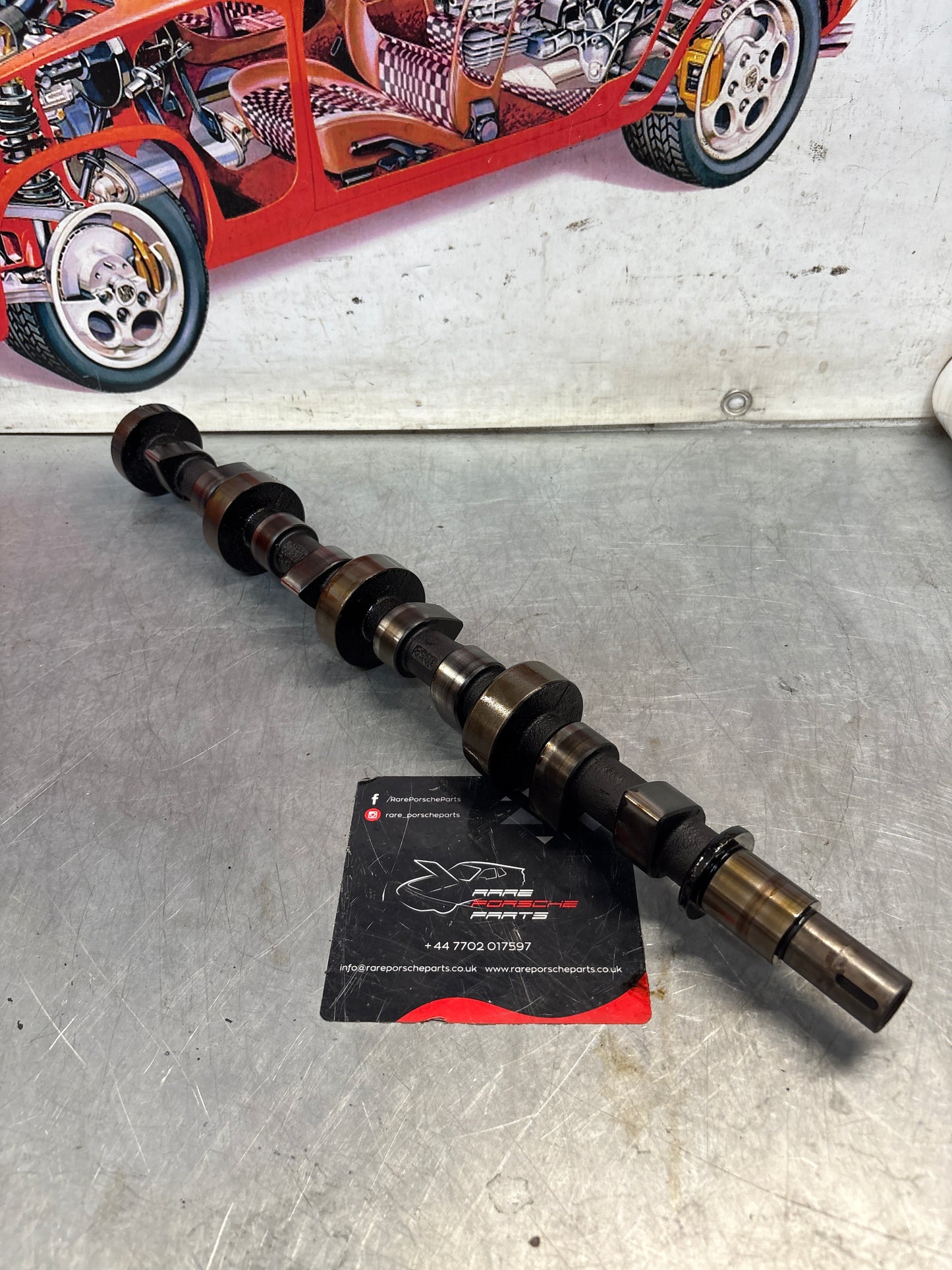 Porsche 928 cam shaft, used 9281052030R
