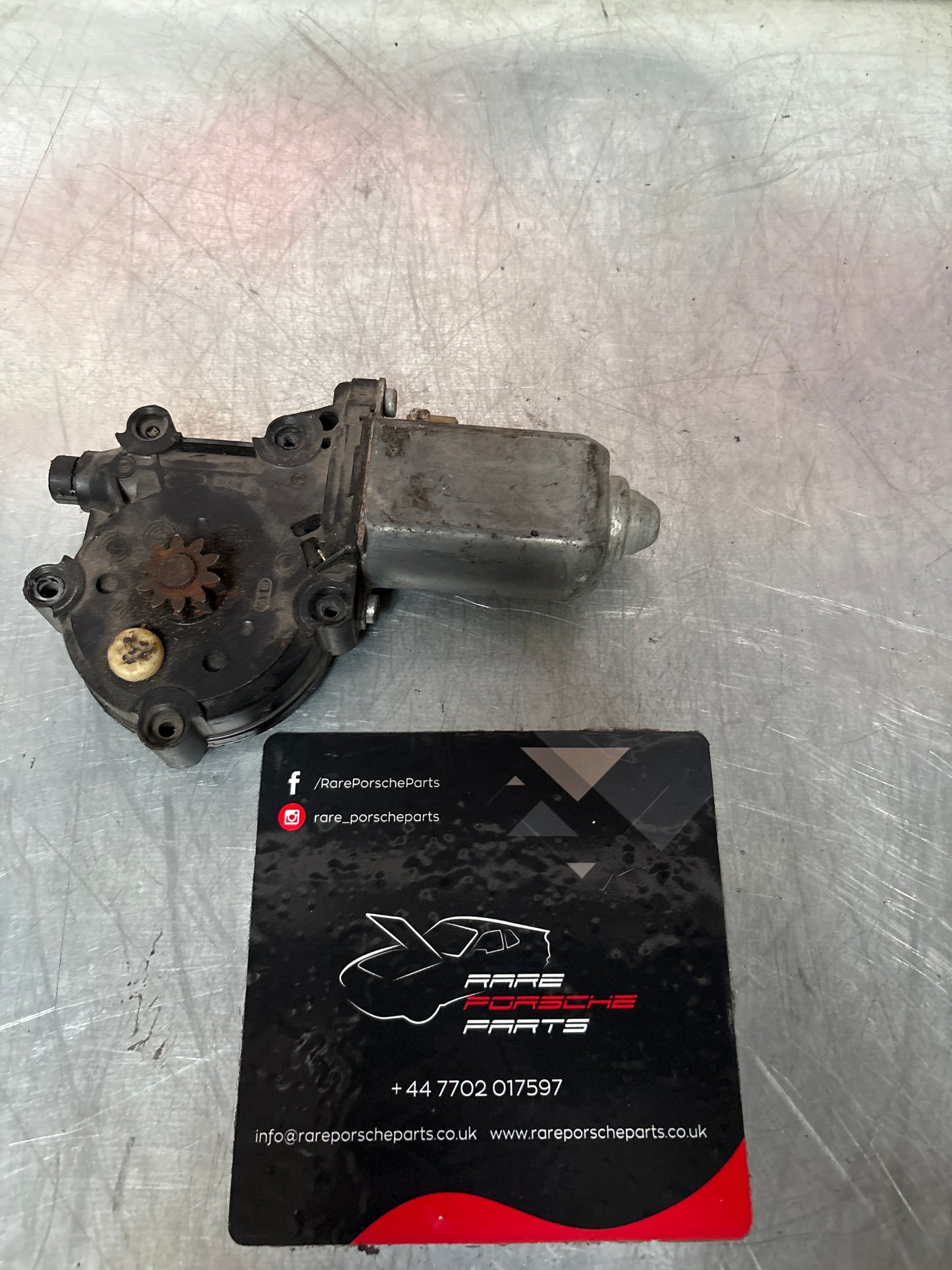 Porsche 911 964 left side window motor, used 0130821253