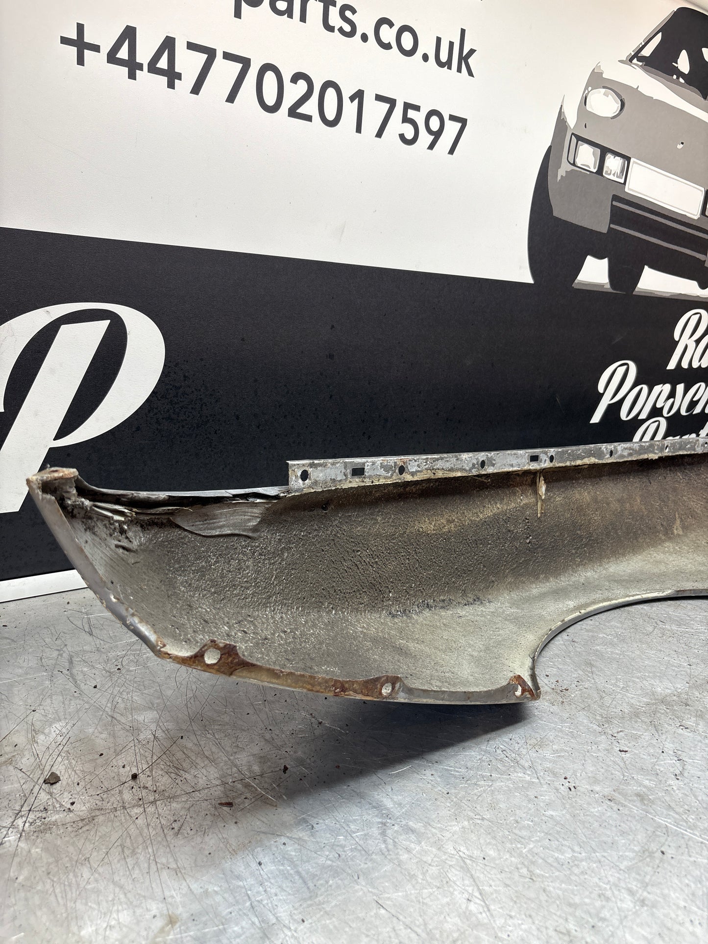 Porsche 944, early front right wing, in need of repair