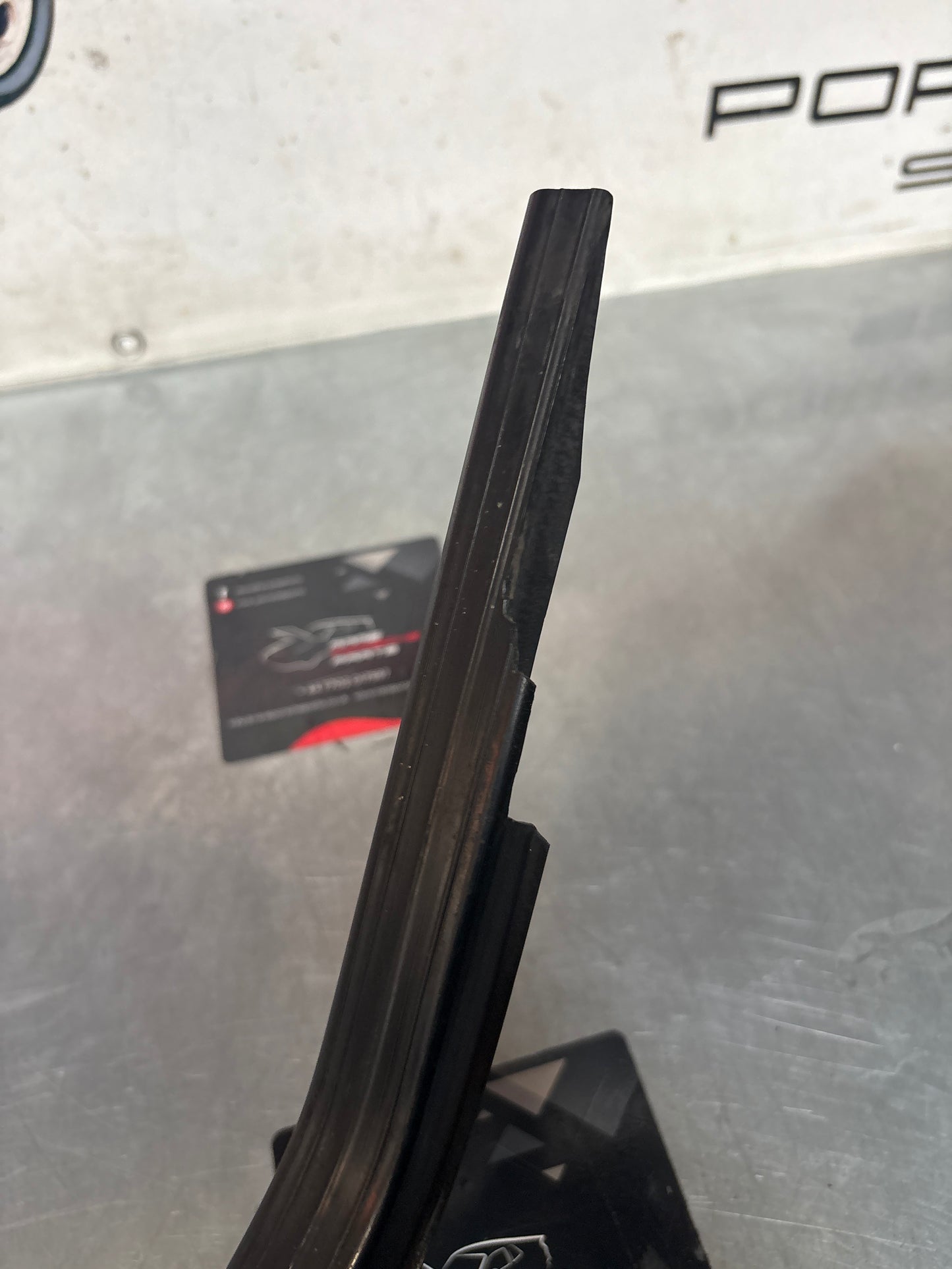 Porsche 944 85.5- left sill trim, scuff plate used 94455112100 cracked