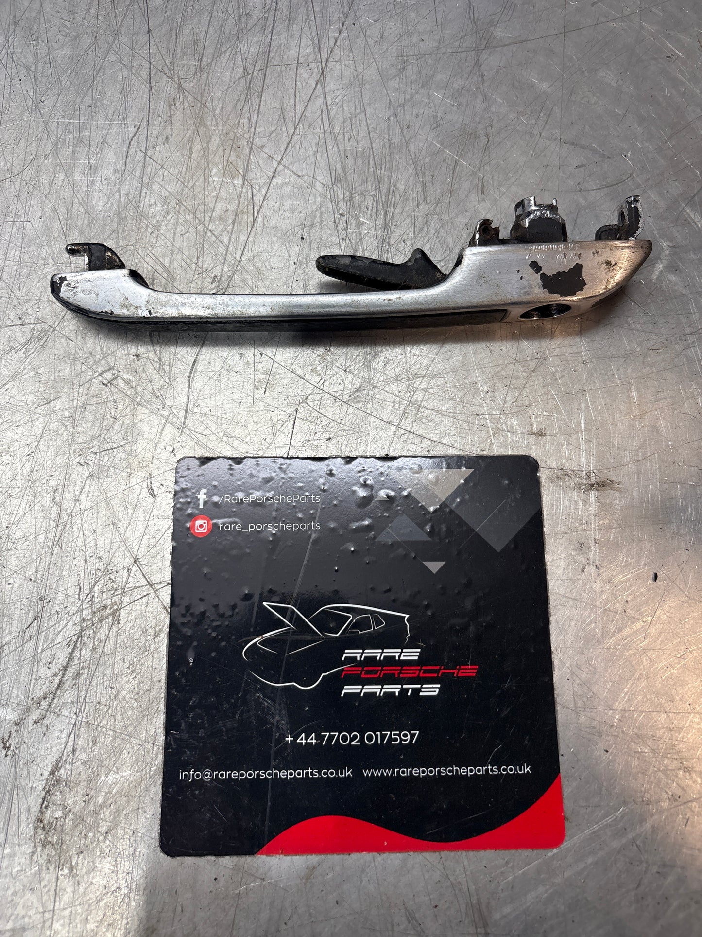 Porsche 924 early 76-79 Left or Right door handle without lock cylinder, chrome 477837037H, used
