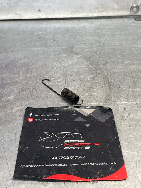Porsche 944 return spring, used 477711975