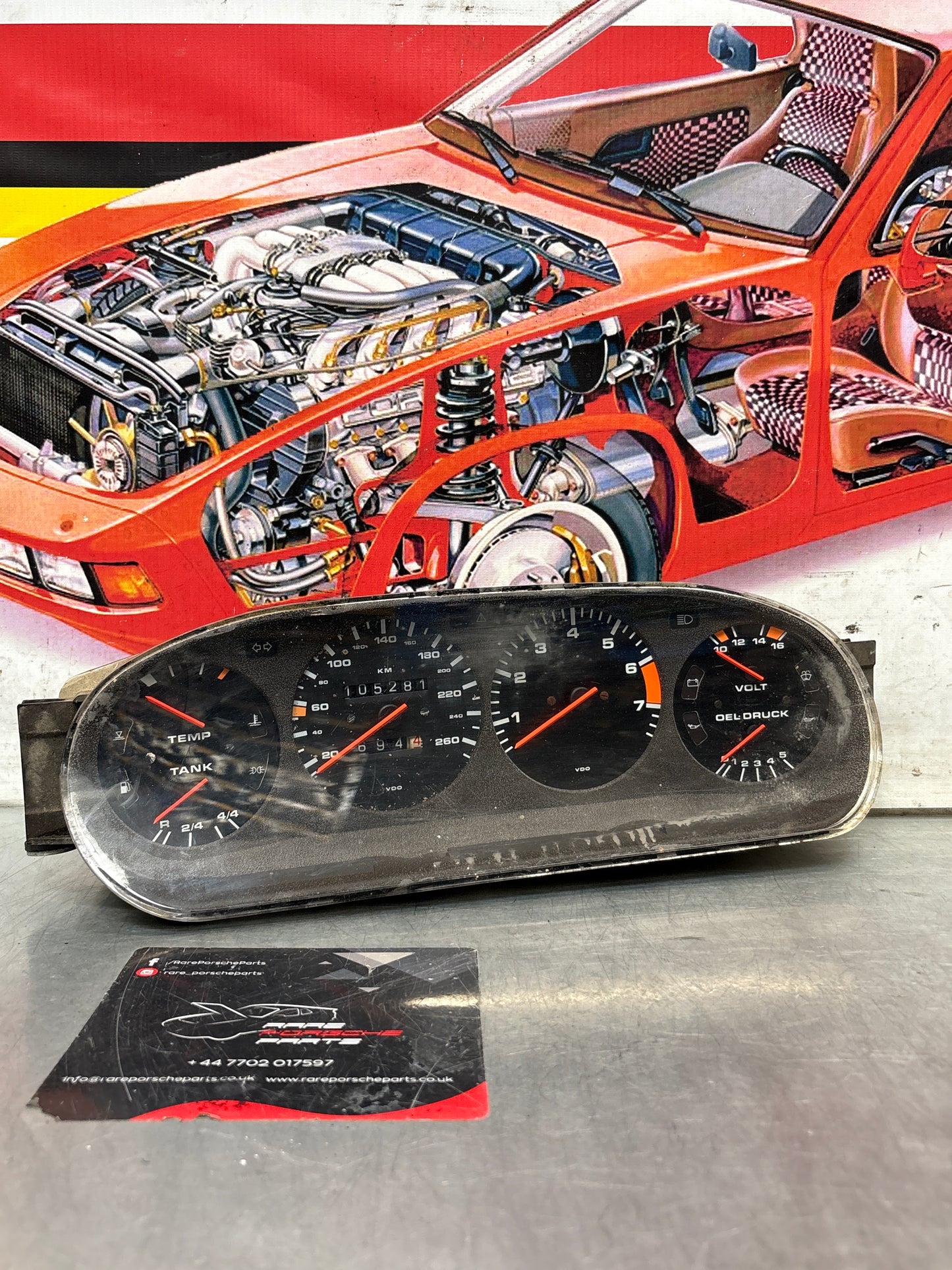 Porsche 928 dash clock binnacle pod speedometer, 92864110130 used  showing 105281 Km, plastic screen has some scratches