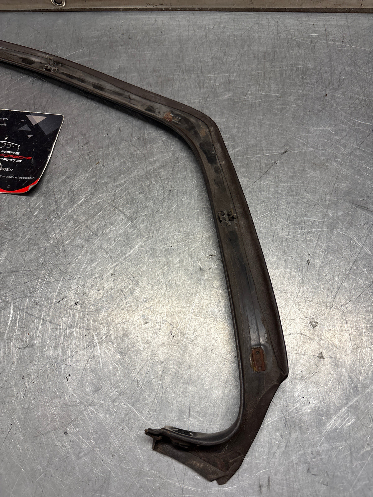 Porsche 928 left, off side door upper frame surround trim, brown 92855502502, used