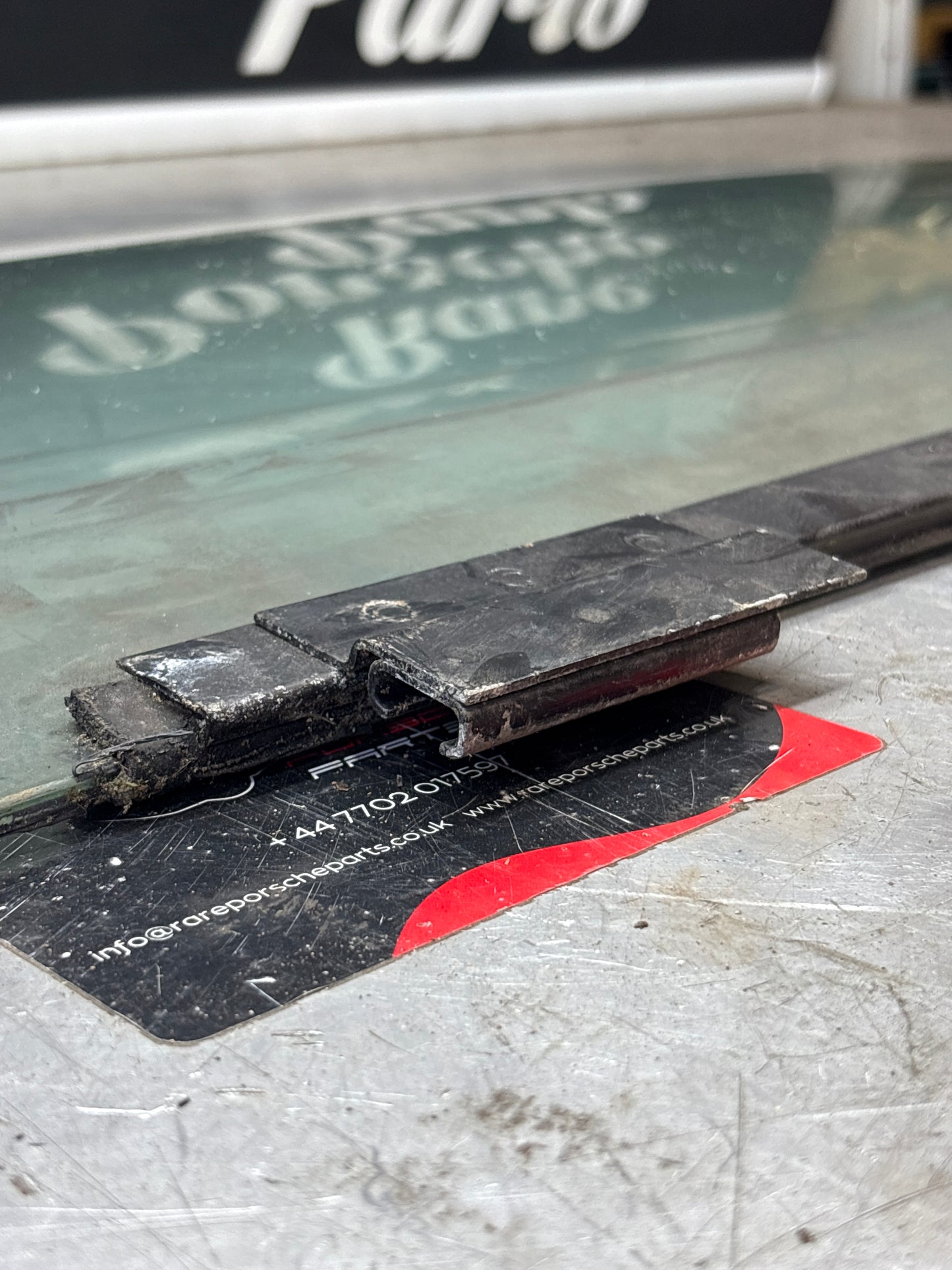 Porsche 944 Left side door glass, tinted green used 94454202301