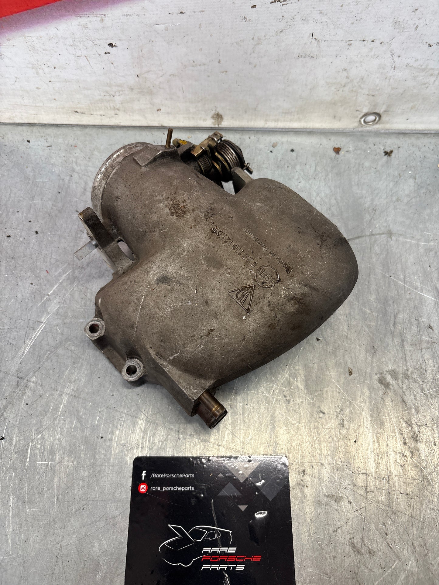 Porsche 928 throttle body intake bridge idle speed control valve, used 9281101210R