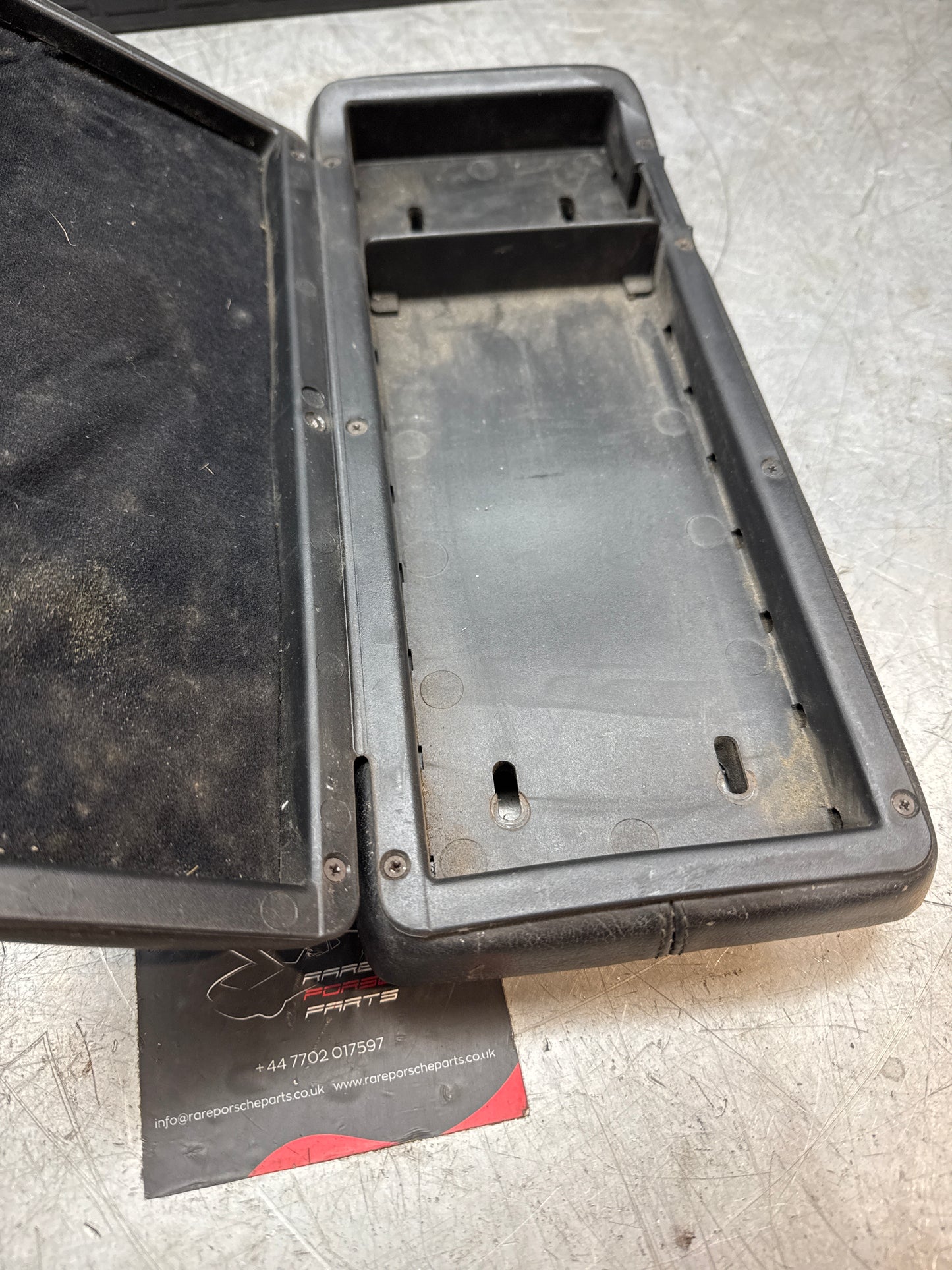 Porsche 928 92755572903 Central armrest cassette compartment black, used RHD