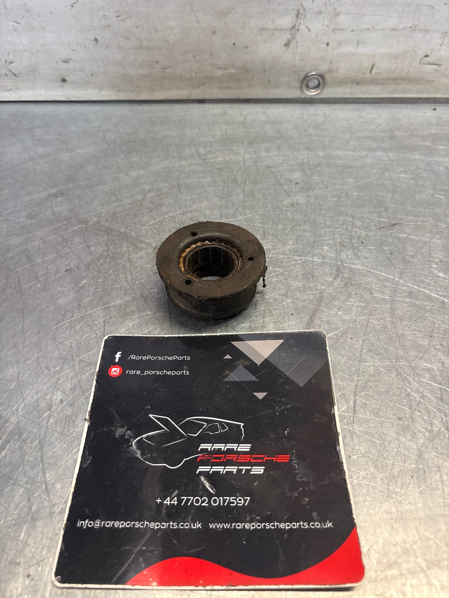 Porsche 924/944 steering coloumn cover lower bearing, used 477419059