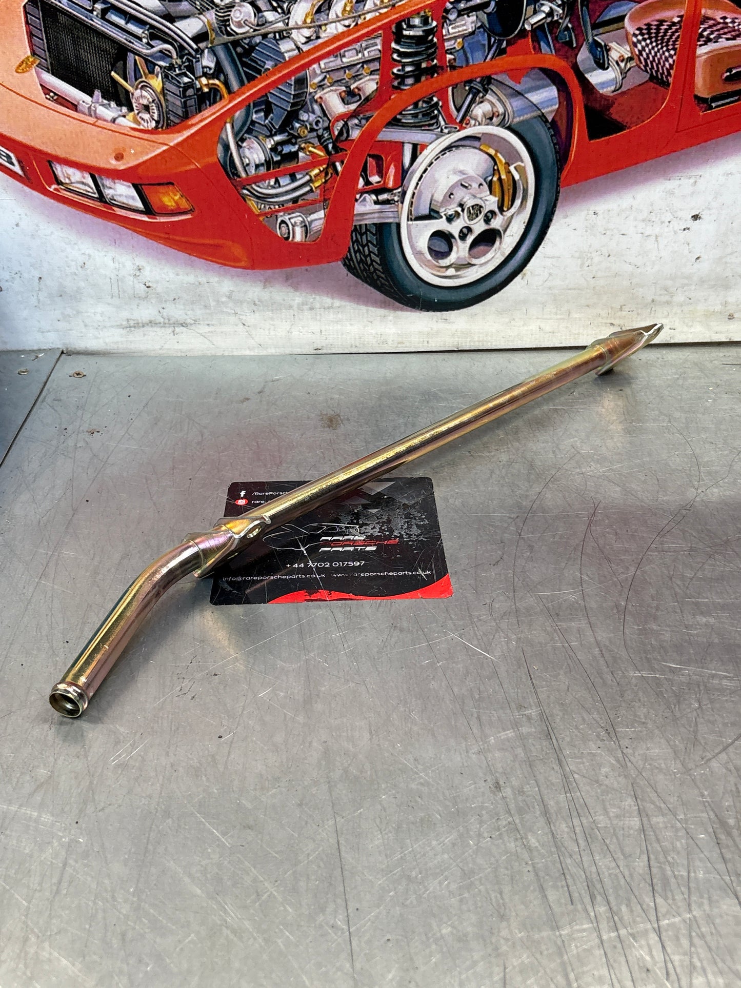 Porsche 944 2.5 924S water pipe on cylinder head 94410624302 refurbished