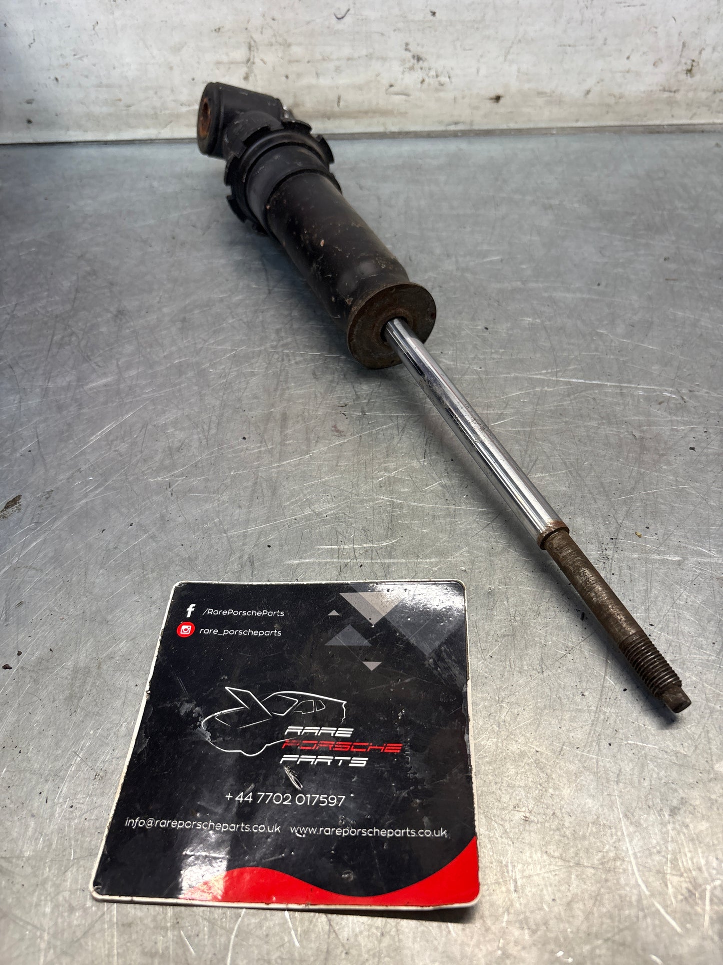 Porsche 928 rear shock absorber, used 92833305116