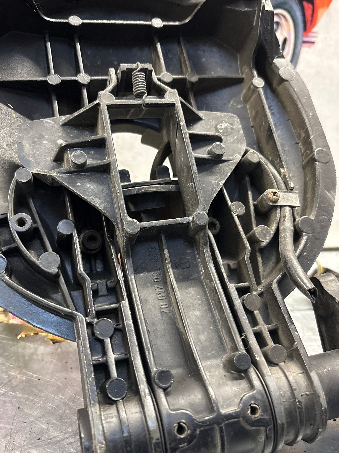 Porsche 928 right headlight swivel frame 92875024902 92875024302 used